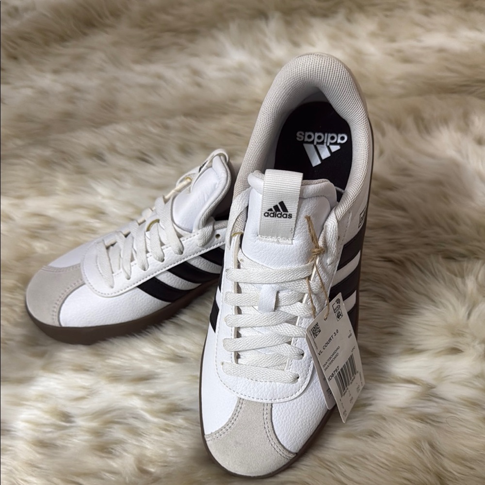 Adidas women’s White and Black Sneakers